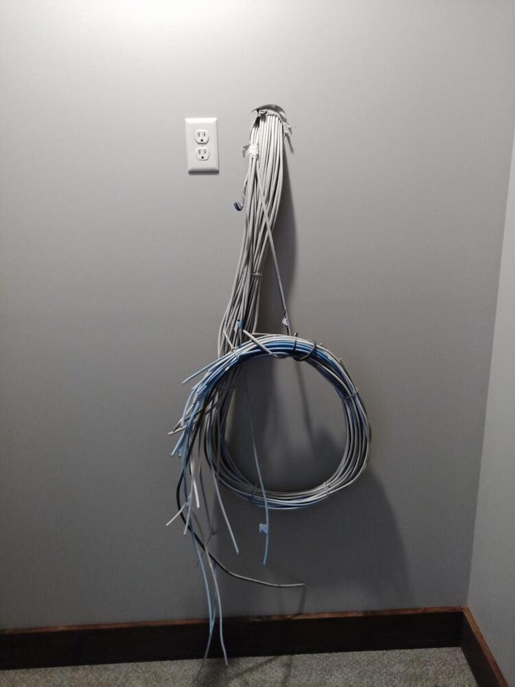 Bundled network cables staged for termination